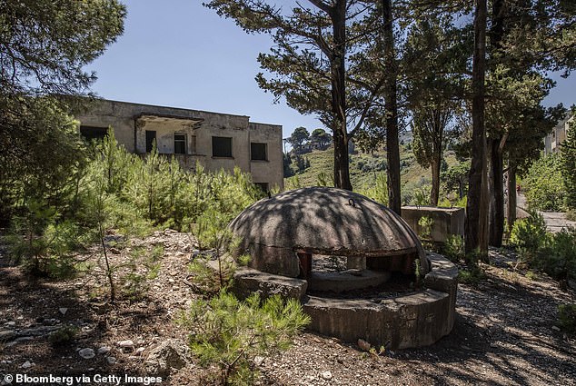 A Cold War-era bunker on Sazan island, Albania, is seen above