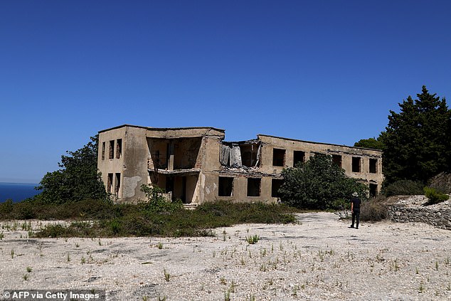 Pictured: An old military command building sitting atop a hill on Sazan