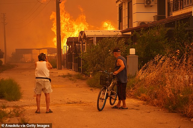 Residents watched on in horror as the fire spread into neighbourhoods