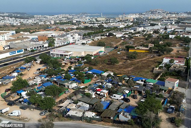 Locals have been forced to move into shanty towns and even tents. Pictured: A general drone view shows a makeshift settlement called Can Rova 2