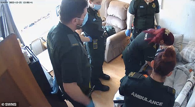 Medical staff are seen here about to take John Attard from his home in Bexley, Kent