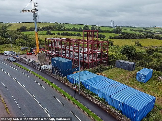 The construction project is well underway but has had delays, including businesses refusing to provide materials, managers have said