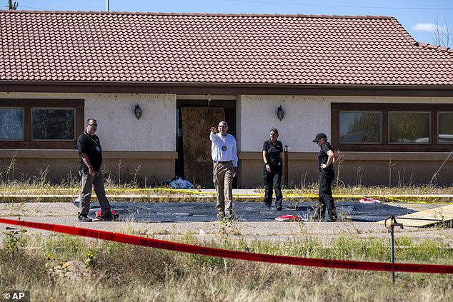 Fremont County coroner Randy Keller are seen in 2023 when they found the building where 190 bodies had been stashed away and left to rot