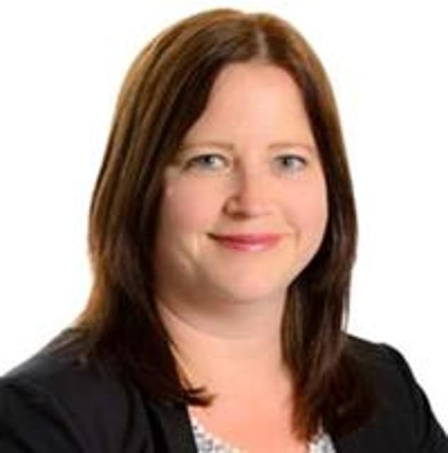 The face of his Tameside borough councillor wife Allison Gwynne (pictured), who is also suspended over the WhatsApp scandal, has been scrawled over on information posters