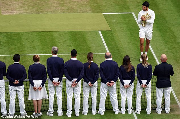 Defending men's single's champion Carlos Alcaraz is seen here with line judges in 2023