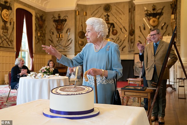 The late Queen made guests laugh as she joked about cutting a cake during a special reception for the historic milestone - with attendees saying she was on 'sparkling' form.