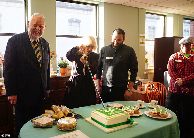 Camilla, the Queen Consort, paid tribute to her mother-in-law in December 2023 as she cheekily cut a cake with a sword