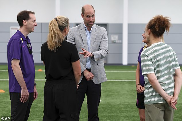 William (centre) is patron of the Football Association