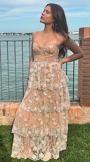 In photos shared on Instagram, the young adult upstaged her mom as she modeled a nude-toned beaded dress with a tiered skirt