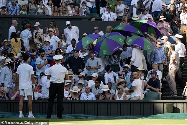 Alcaraz spent time helping the fan and keeping an eye on her as stewards tended to her
