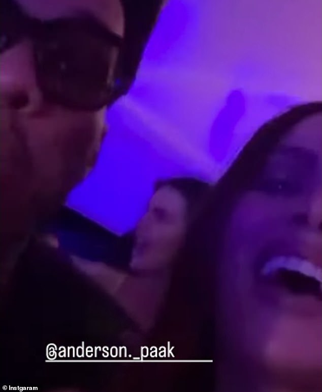 Meanwhile Kendall Jenner (centre) was spotted dancing with Brazilian singer Anitta (R)
