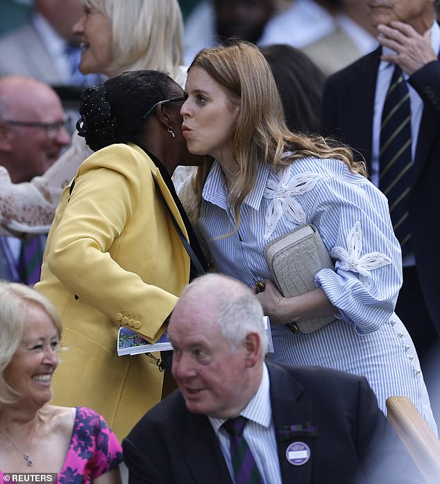 Princess Beatrice appeared in high spirits as she greeted guests in the Royal Box on Monday