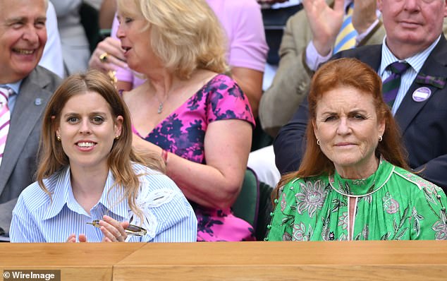 Prince Andrew's ex-wife styled her bold and vibrant look with a simple brown box bag and simple diamond hoop earrings