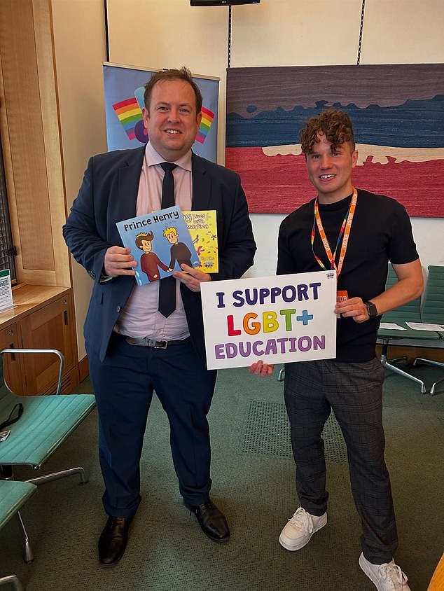 Foreign Office minister Stephen Doughty (pictured left) was among those pictured with Pop'n'Olly, a group which promotes 'transgender Cinderella' books to primary schools