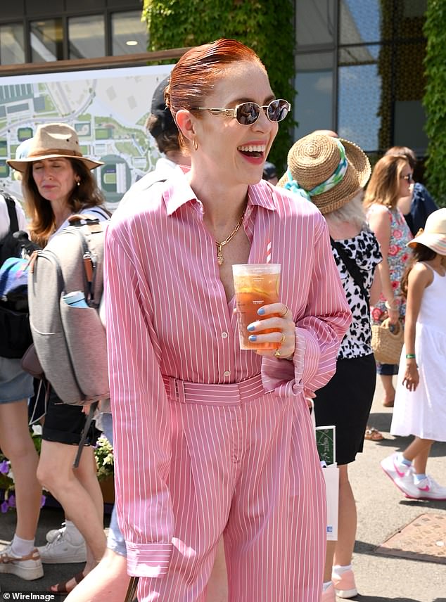 Angela Scanlon was pictured with a glass of Pimm's, a traditional favourite at SW19