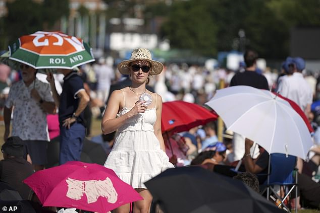Maximum temperatures of 46.6°C (115.9°F) are now 'plausible' in the UK due to climate change. People queue at the entrance on the first day of the Wimbledon Tennis Championships in London, Monday, June 30, 2025