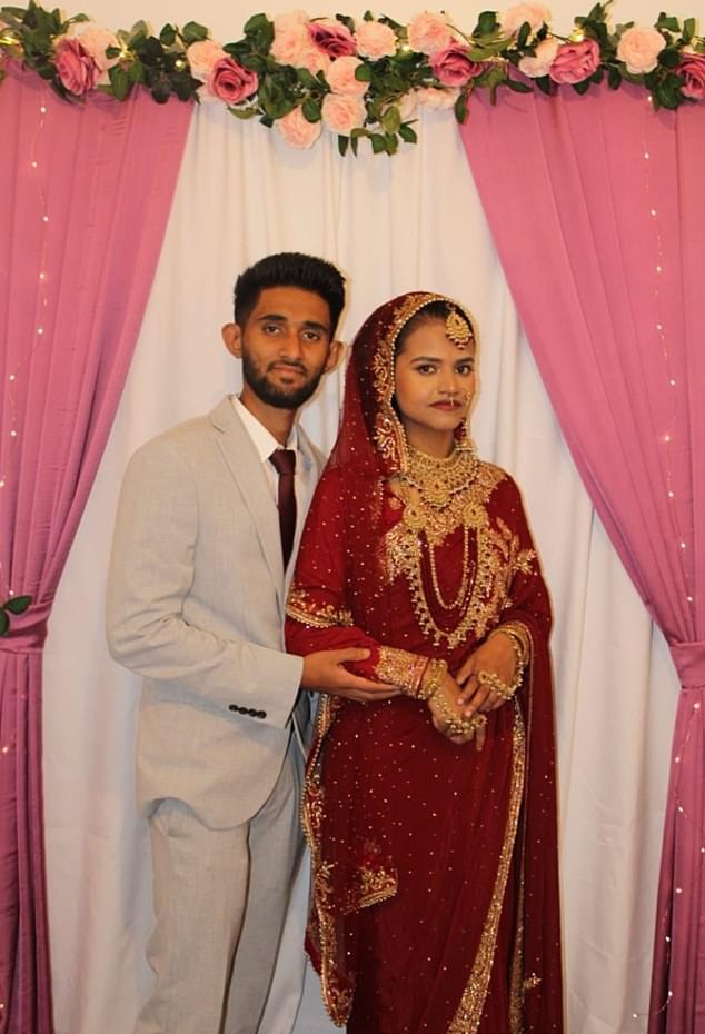 Kulsuma Akter, 27, pictured with husband Habibur Masum, 26, dressed in traditional finery at their wedding in Oldham