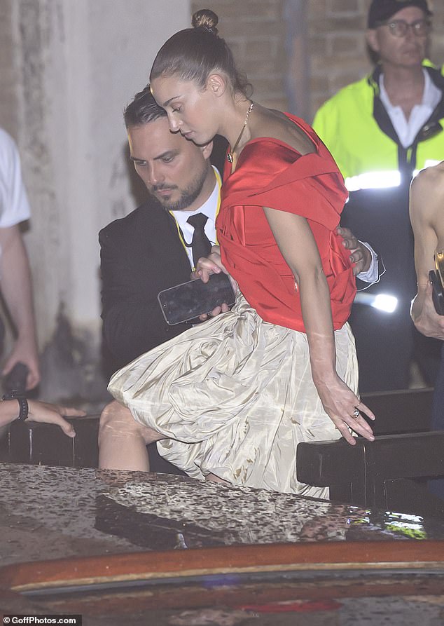 The mystery woman boarding the boat just before embracing Orlando last night