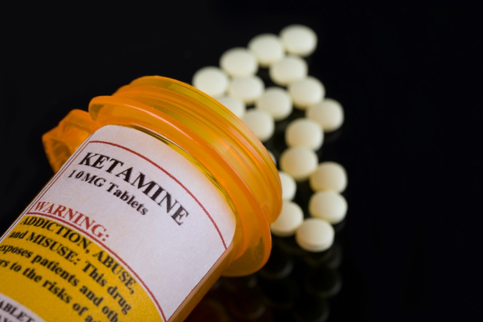 Prescription bottle of Ketamine with warning label about addiction and misuse.