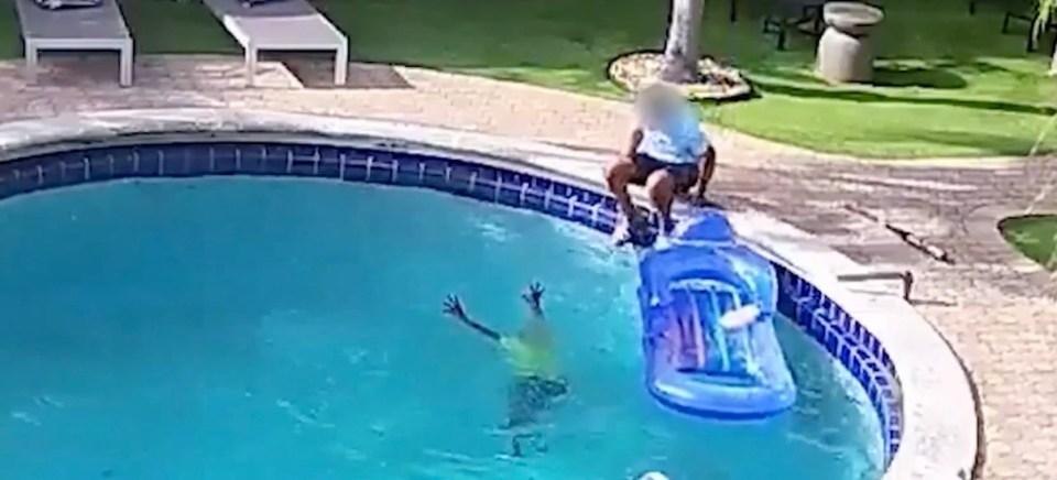 A six-year-old boy drowning in a pool while an adult watches helplessly until a stranger intervenes.
