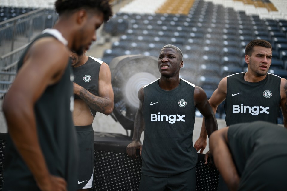Chelsea F.C. players cooling down after training.