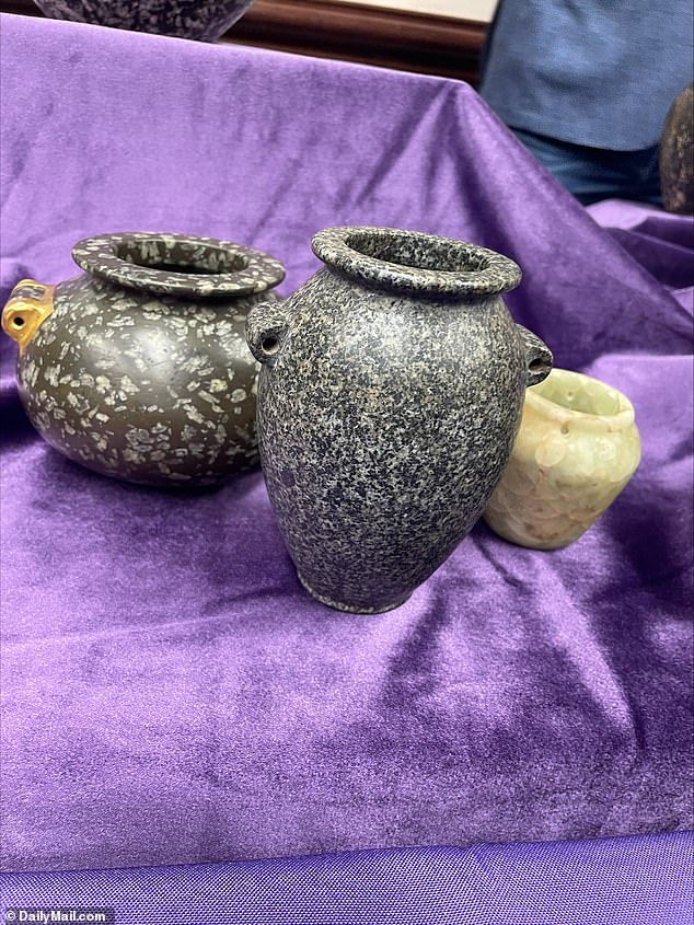 The vases, carved from single blocks of hard stones like granite, limestone and quartz crystal, feature intricately shaped handles, finely hollowed interiors and bases accurate to thousandths of an inch
