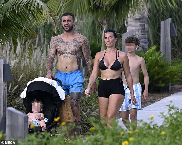 Annie Kilner and Kyle Walker enjoyed some relaxing downtime by the pool during a sun-soaked family holiday in Florida