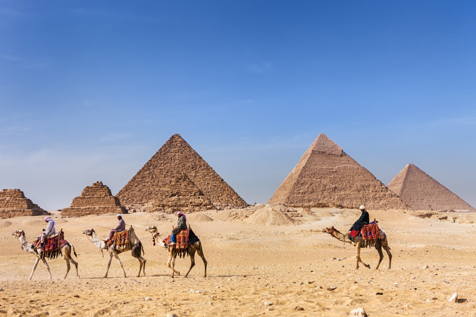 Three pyramids in Giza, Egypt.