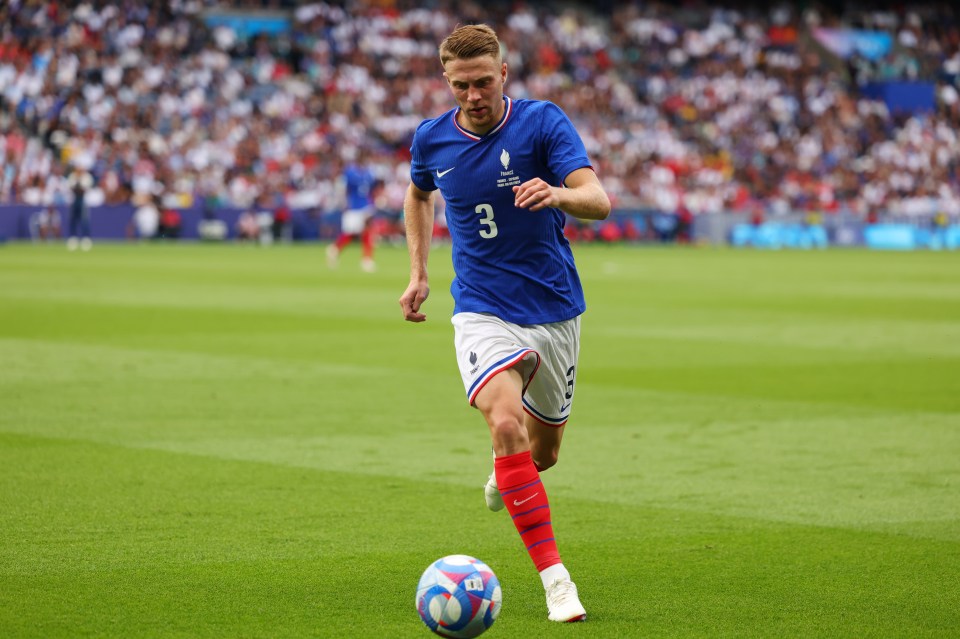 Adrien Truffert of France playing soccer.