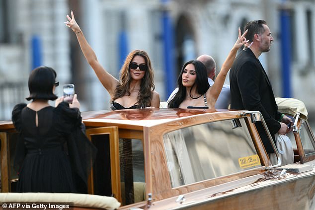 Khloe also put on a stylish display wearing a fitted dress with small cutouts on the material and a lowcut neckline