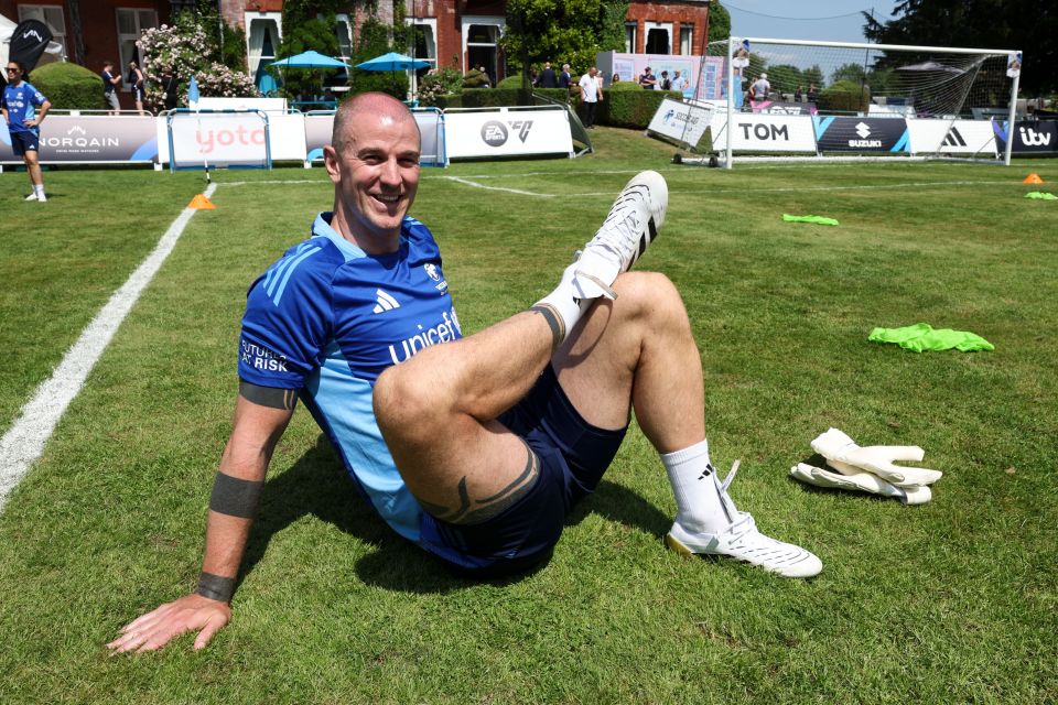Joe Hart stretching during Soccer Aid for UNICEF training.