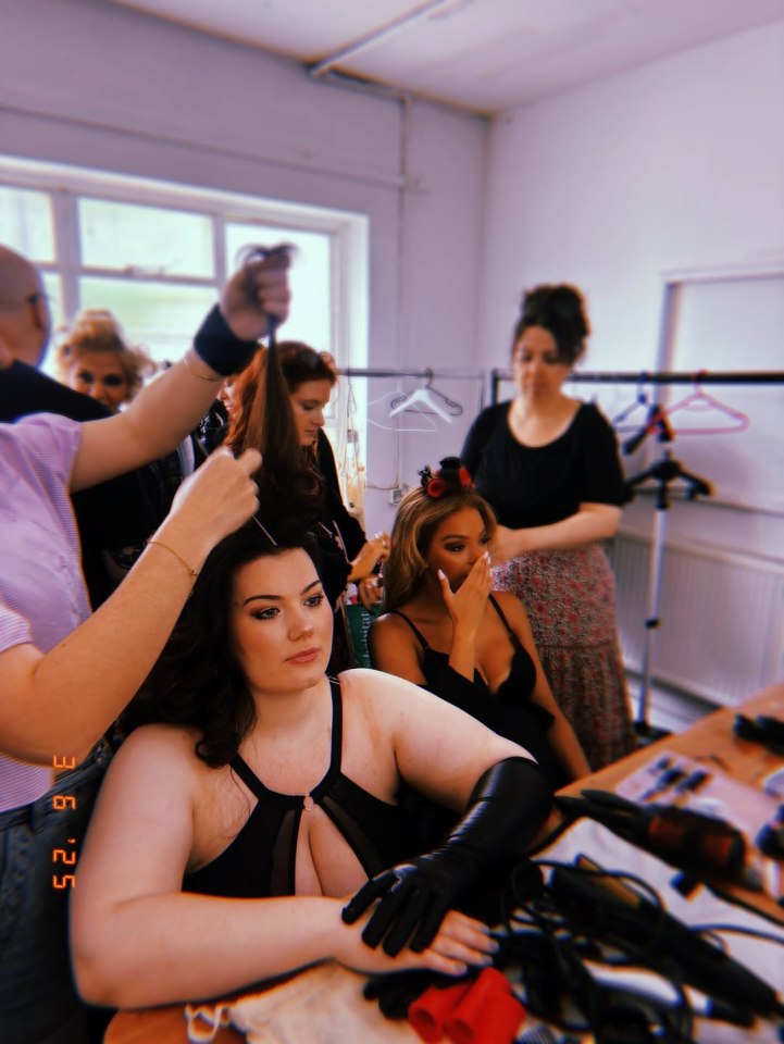 Backstage photo of a burlesque show's hair and makeup preparations.