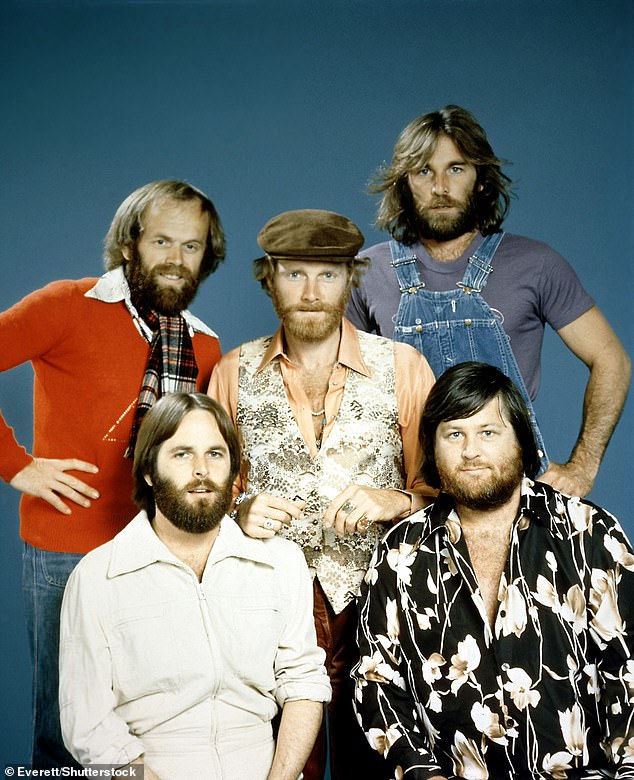 The Beach Boys; Dennis Wilson (standing), and (counter clockwise), Brian Wilson, Carl Wilson, Al Jardine and Mike Love, pictured in 1976
