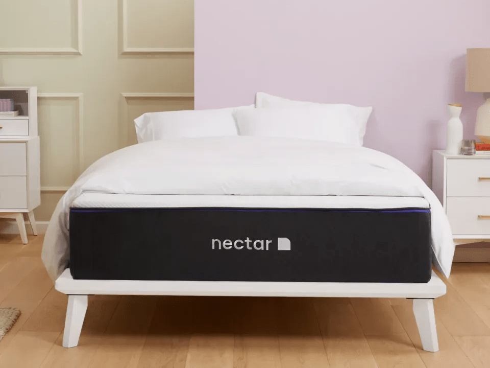 Nectar Premier Hybrid mattress on a white platform bed.