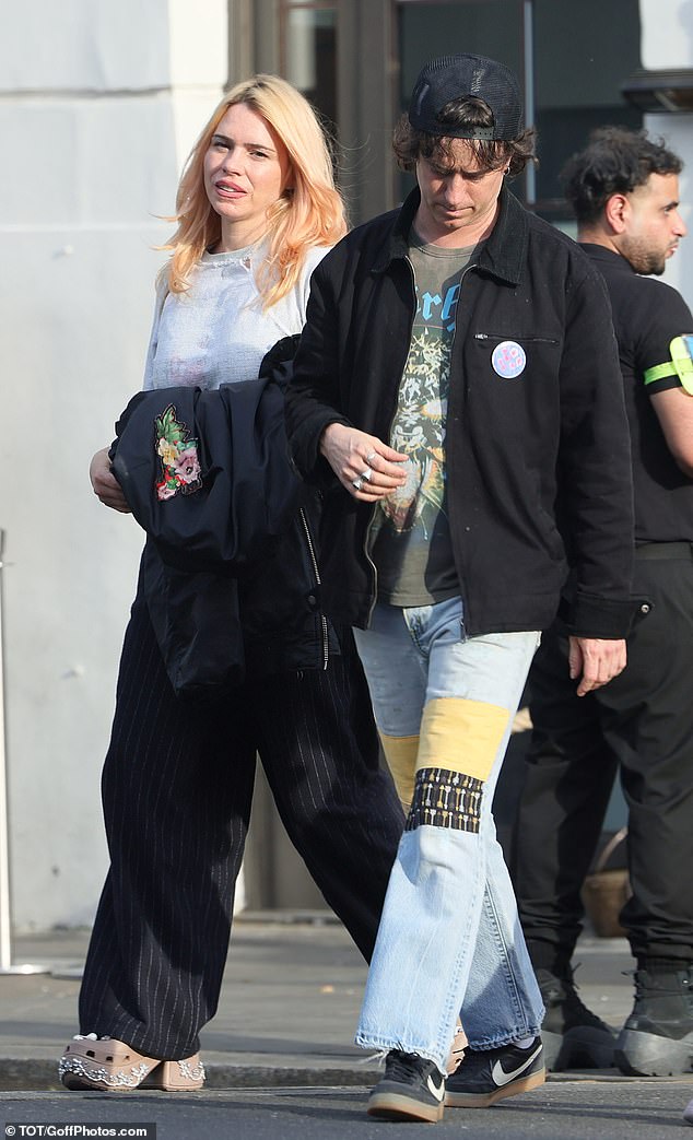 Billie Piper has rekindled her relationship with her ex boyfriend Johnny Lloyd with fans spotted the pair kissing during a family outing to a London pub on Thursday (pictured)