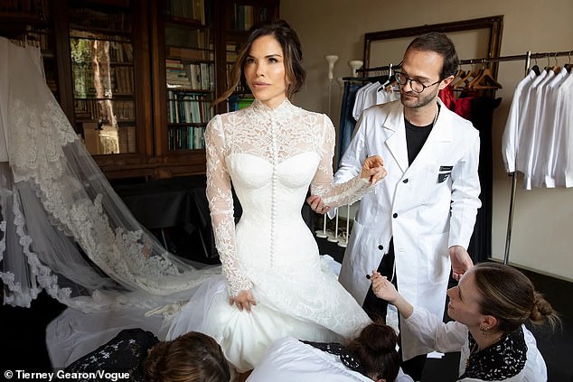 Lauren Sanchez (pictured with a team of tailors from Dolce & Gabbana) was Vogue's digital cover girl for its June edition