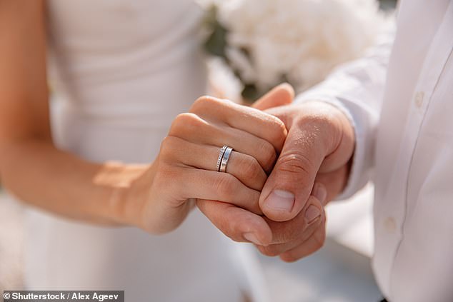 The extras said they had been driven from central Paris on buses at 5am and handed pink bracelets with the names of the 'bride and groom' printed on them (file image)
