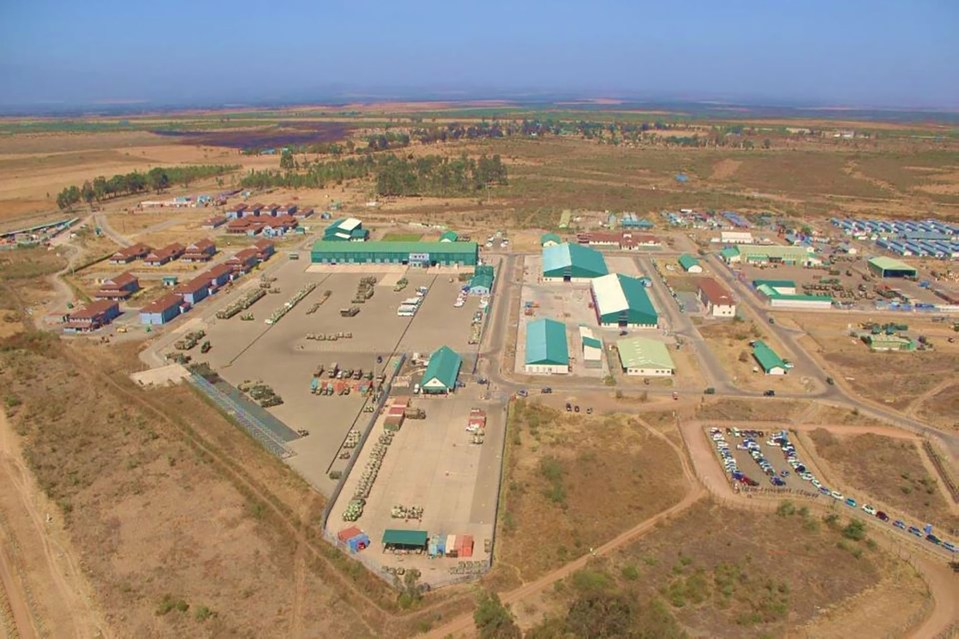 Aerial view of Nyati Barracks, a British Army facility in Kenya, showing buildings, vehicles, and equipment.