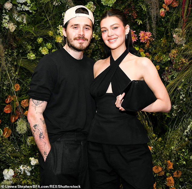Sources close to the family are now waiting to see whether Brooklyn, who lives in Los Angeles with his wife American heiress Nicola Peltz, takes to Instagram to wish David a happy Father¿s Day today (pictured last month)