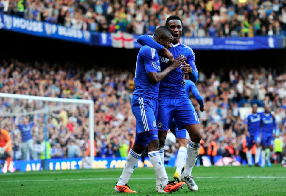 Chelsea's Ivorian striker Salomon Kalou (L) celebrates scoring the winning goal with Nigerian midfielder John Mikel Obi (R) during their English Premier League football match against Tottenham Hotspur at Stamford Bridge in London, England on April 30, 2011. AFP PHOTO/GLYN KIRK  FOR EDITORIAL USE ONLY Additional licence required for any commercial/promotional use or use on TV or internet (except identical online version of newspaper) of Premier League/Football League photos. Tel DataCo +44 207 2981656. Do not alter/modify photo. (Photo credit should read GLYN KIRK/AFP via Getty Images)