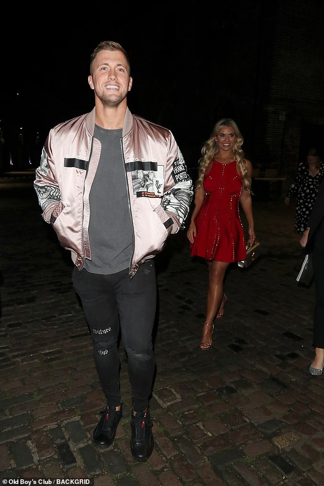 Christine McGuinness, 37, and Dan Osborne, 33, reportedly comforted each other through their marital woes, sources claim (pictured together at a podcast launch party in 2019)