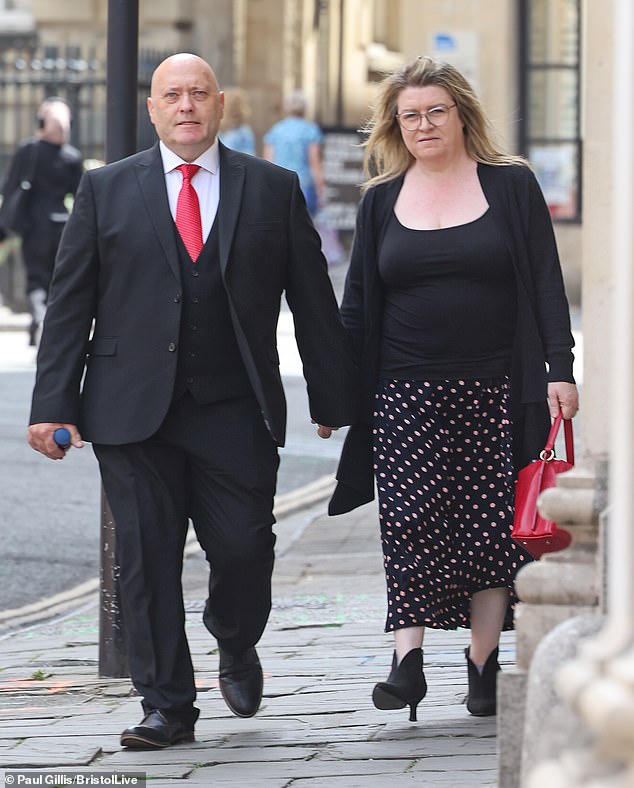 Jamie Brown, pictured with his wife Nina Brown, has been jailed after he took around £100,000 from families, ripped out their kitchens and fled with their money
