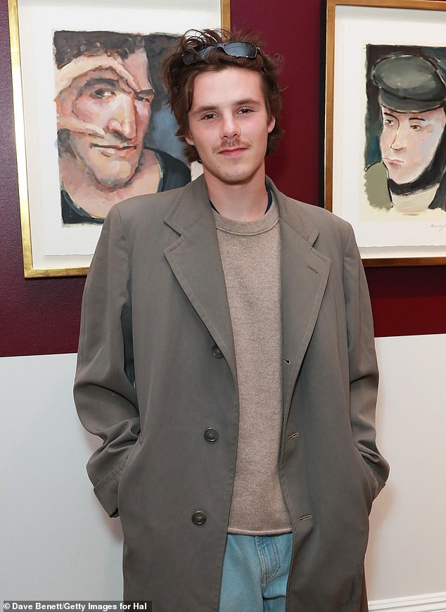 Cruz Beckham, 21, (pictured) appeared to take yet another swipe at elder brother Brooklyn and declared the 'truth would unfold' as the family's bitter feud continues to rumble on