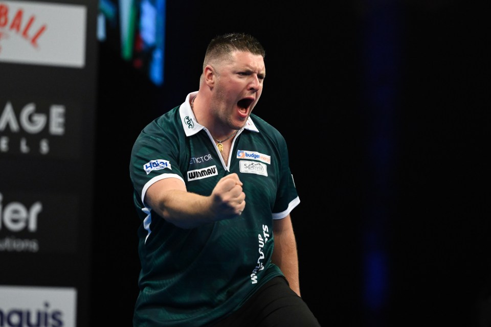 Daryl Gurney of Northern Ireland celebrating during a darts match.