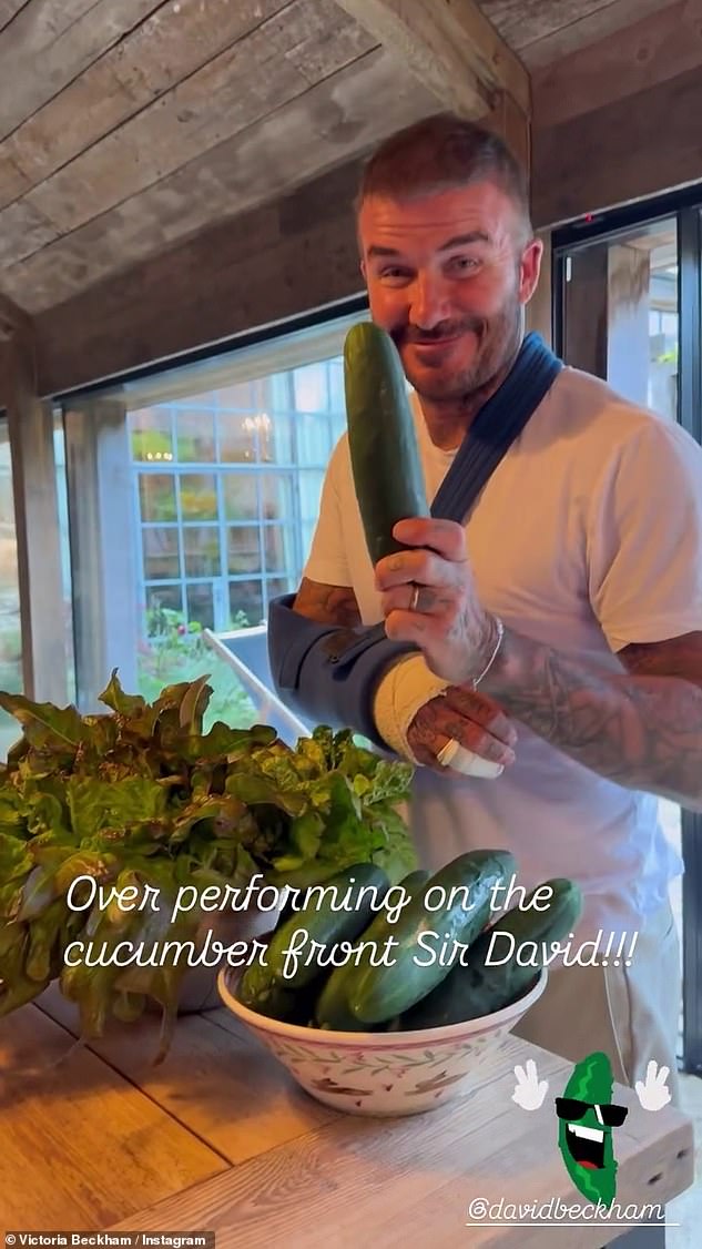 David Beckham displayed his bandaged hand in a sling on Saturday as he recovered at home following an operation on his injured wrist