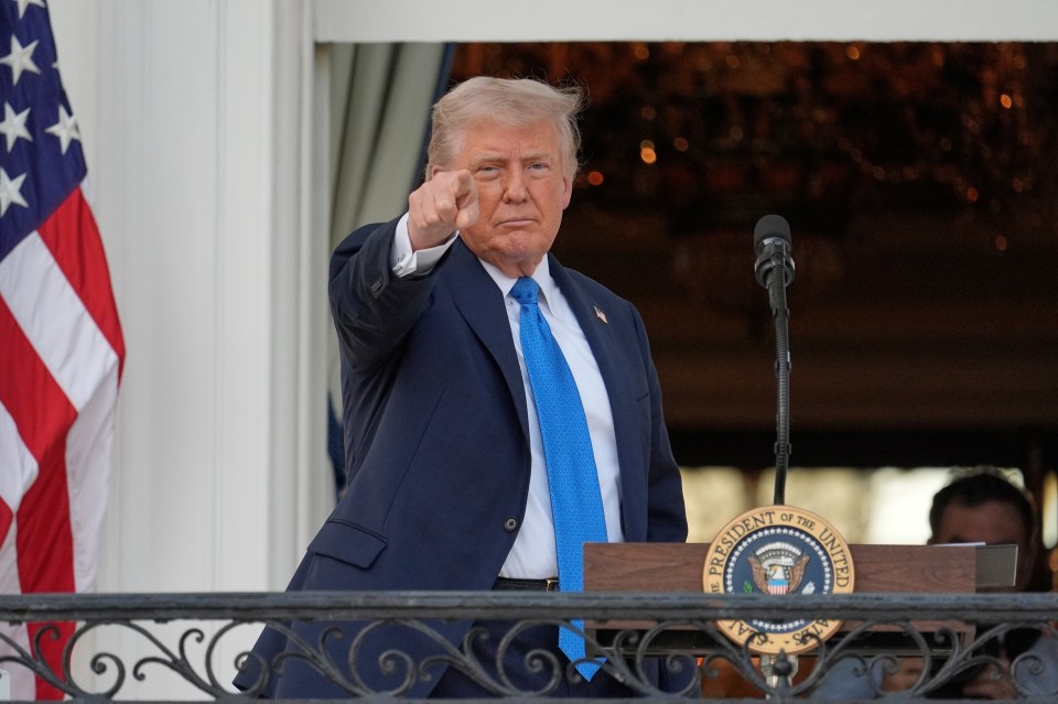 President Donald Trump speaking and gesturing.