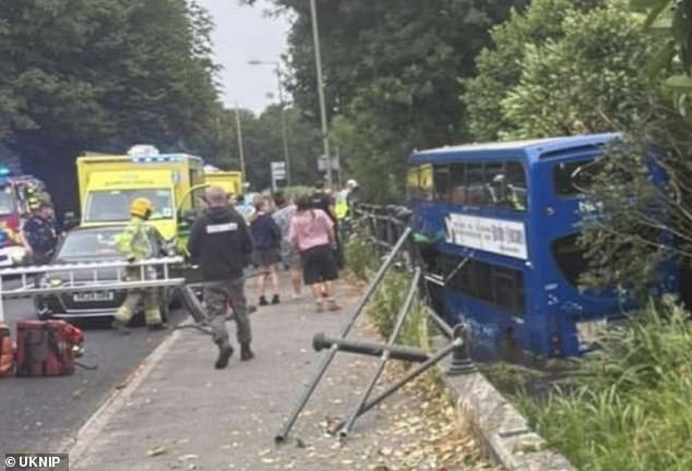 The double-decker bus left the road and ended up in the water in Eastleigh, Hampshire, today