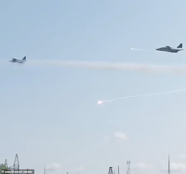 The footage shows heat trap flares and possible missiles from the Su-25s