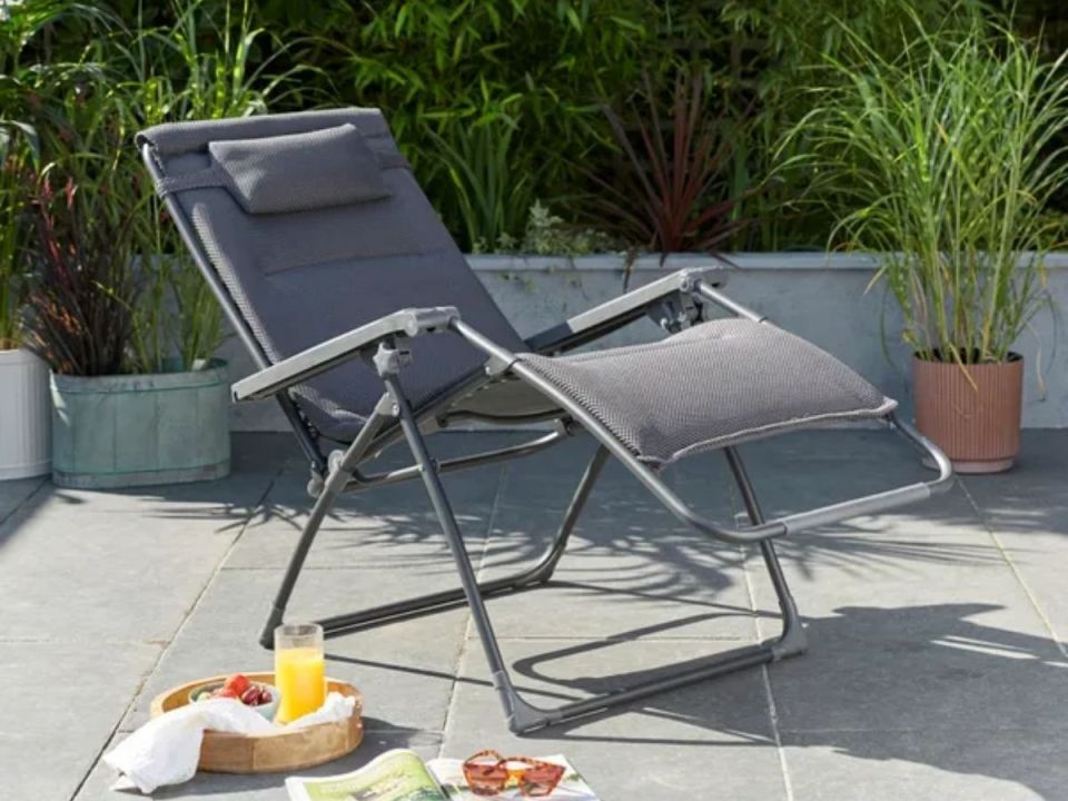Grey reclining patio lounger.