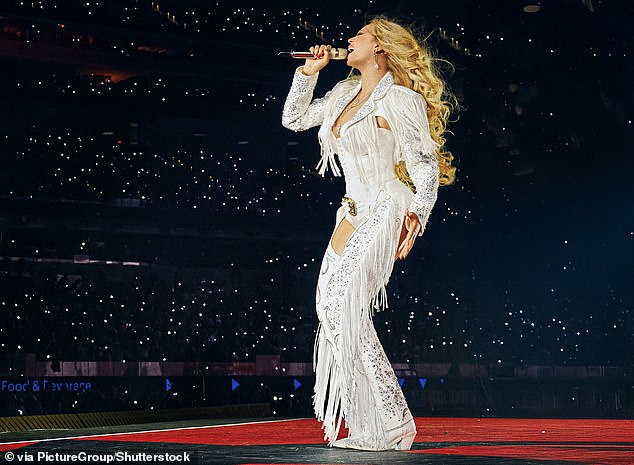 Star-spangled singer: Beyoncé on stage in Los Angeles last month
